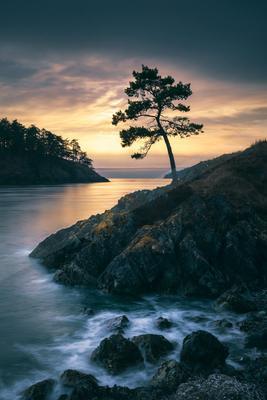 A blue hour long exposure sky scene of sunset, sunrise, lake.