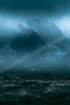 A mysterious panorama landscape of a mountains, fog.