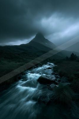A serene landscape of mountains, river, waterfall.