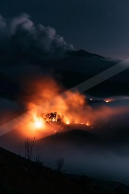 A night sky scene of sunrise, fog.