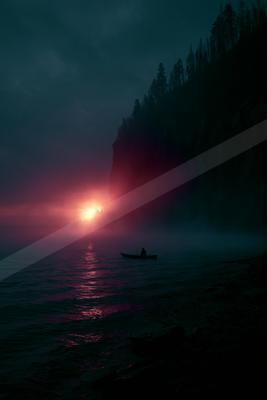 A lone figure sits in a small boat on a calm lake as the sun sets behind a misty, forested cliff, casting a vibrant red and pink glow across the water and fog.