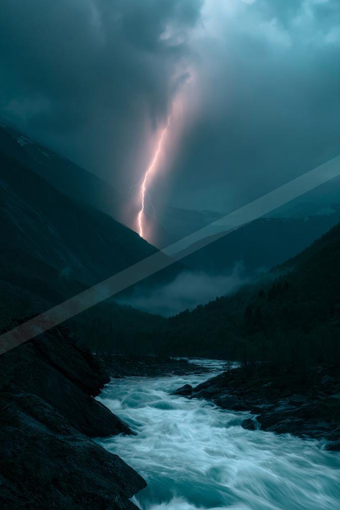 A dramatic sky scene of storm, waterfall.