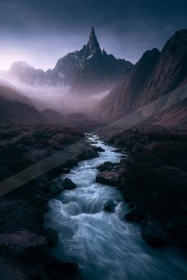 An ethereal panorama landscape of a mountains, fog.