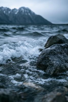 A dramatic water scene of ocean, rocks.
