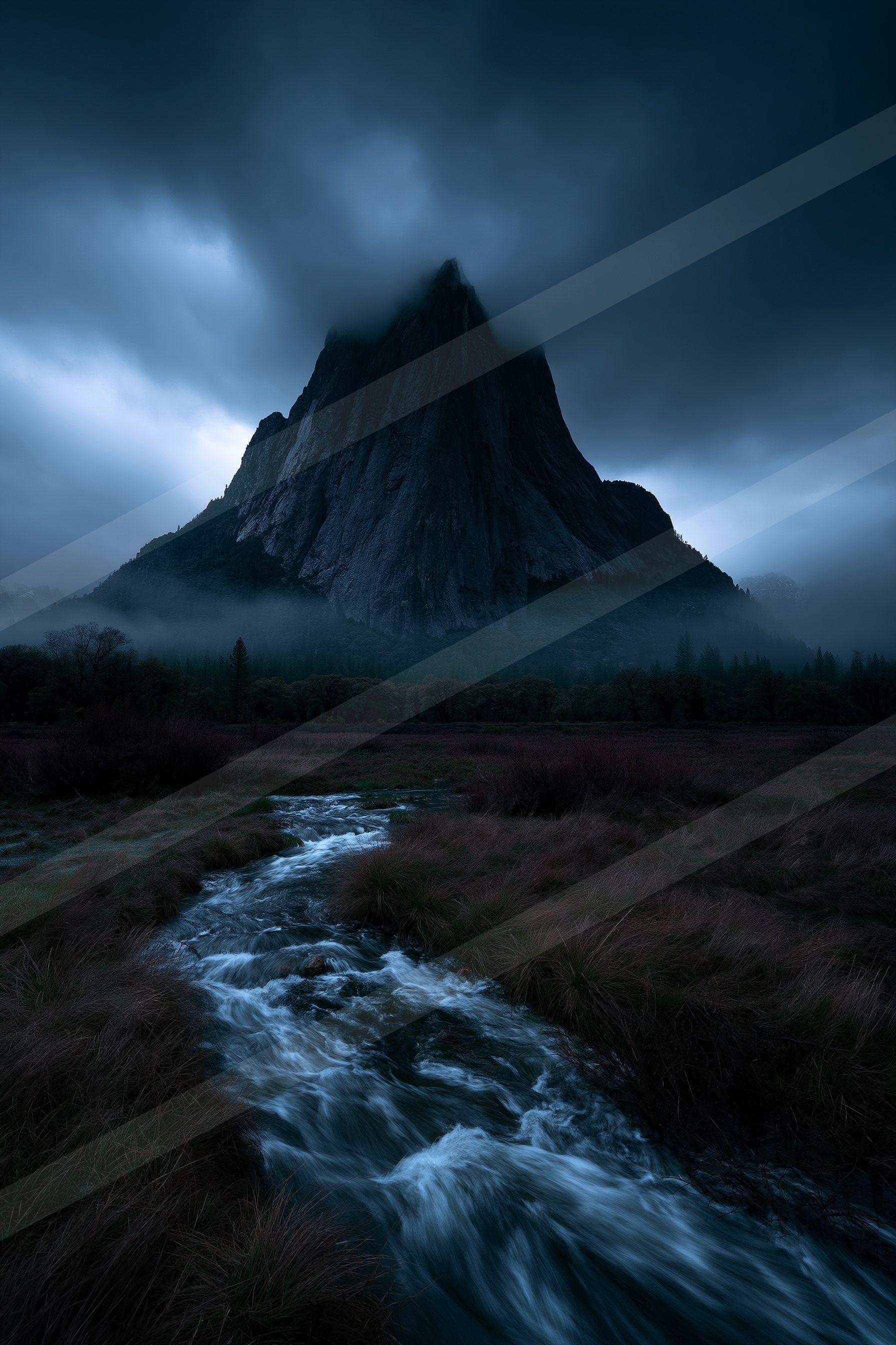 A mysterious long exposure landscape of a mountains, fog.