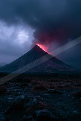 A moody landscape of mountains.