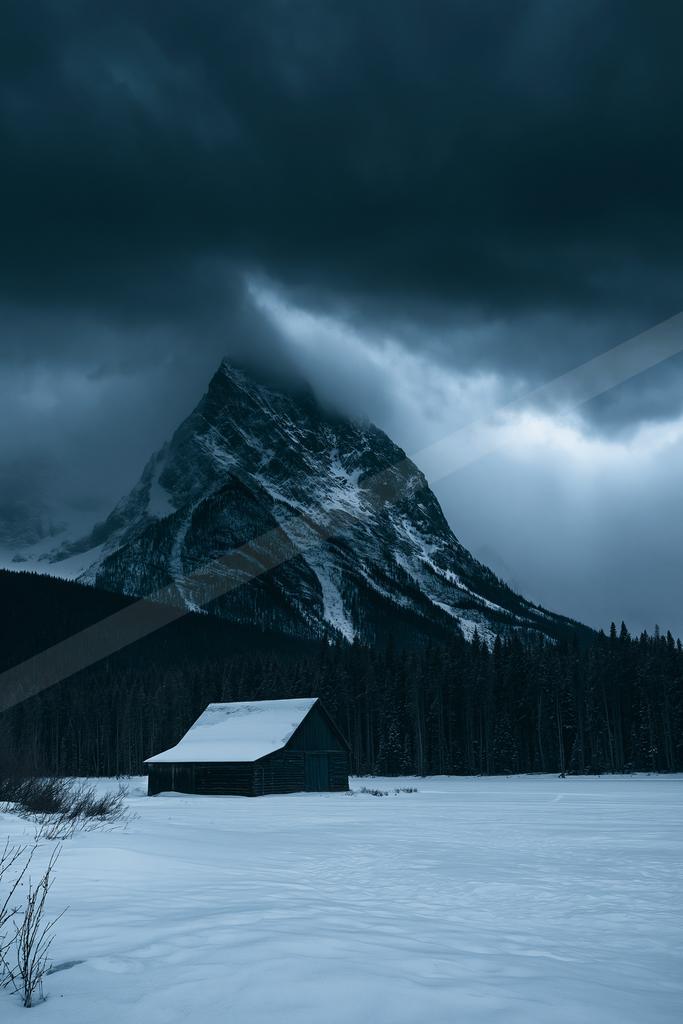 A night landscape of mountains, storm, lake.