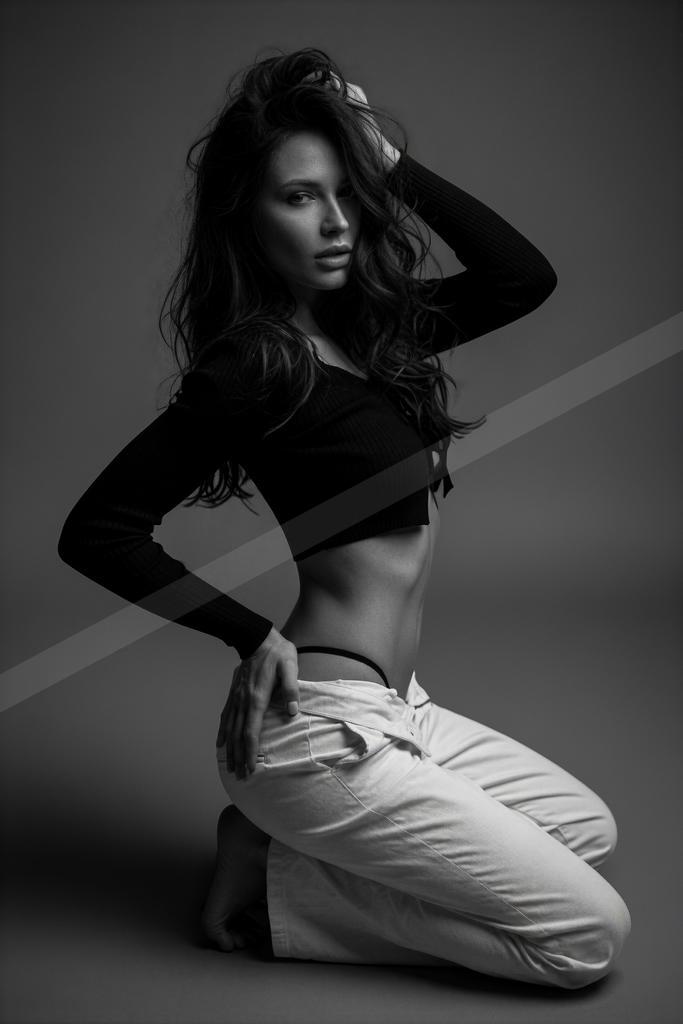 A black-and-white moody portrait.