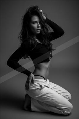 A black-and-white moody portrait.