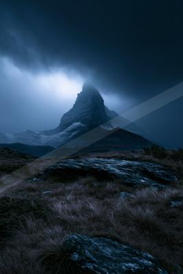 A night landscape of mountains, storm, fog.