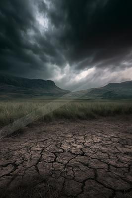 A black-and-white moody sky scene of storm.