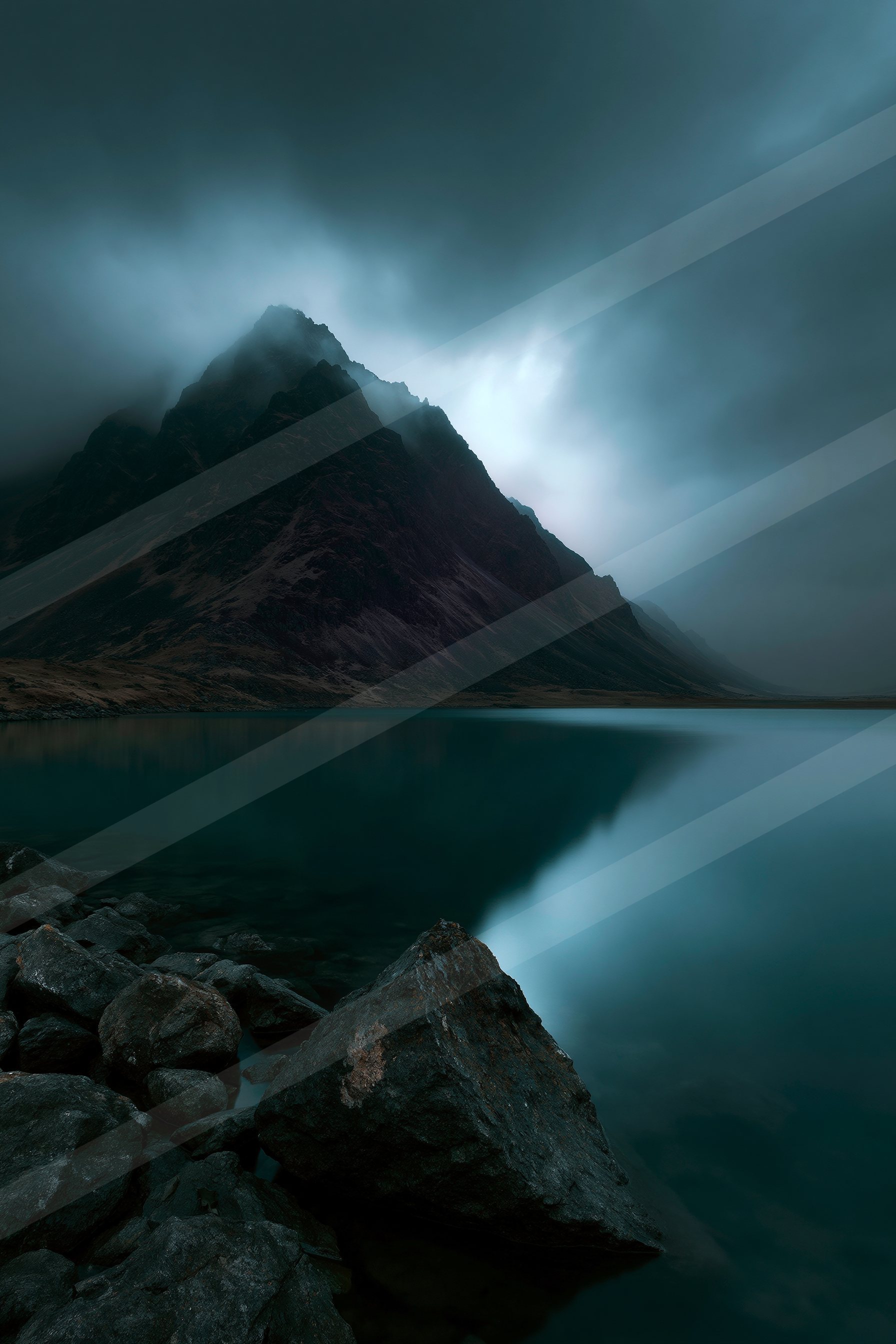 A mysterious long exposure landscape of a mountains, reflection.