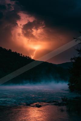 A dramatic long exposure sky scene of storm, sunrise, clouds.