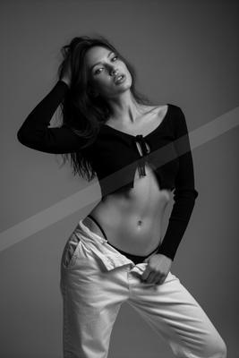 A black-and-white moody portrait.