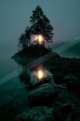 A night double exposure sky scene of an aurora, reflection.
