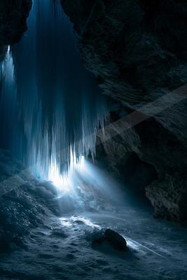 A moody water scene of waterfall.