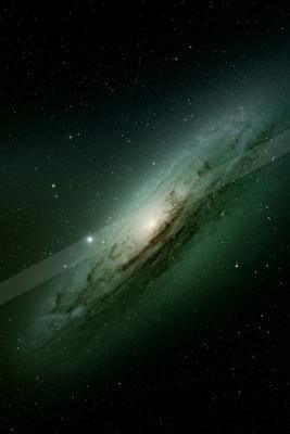 A stunning spiral galaxy dominates the frame against a star-studded night sky.