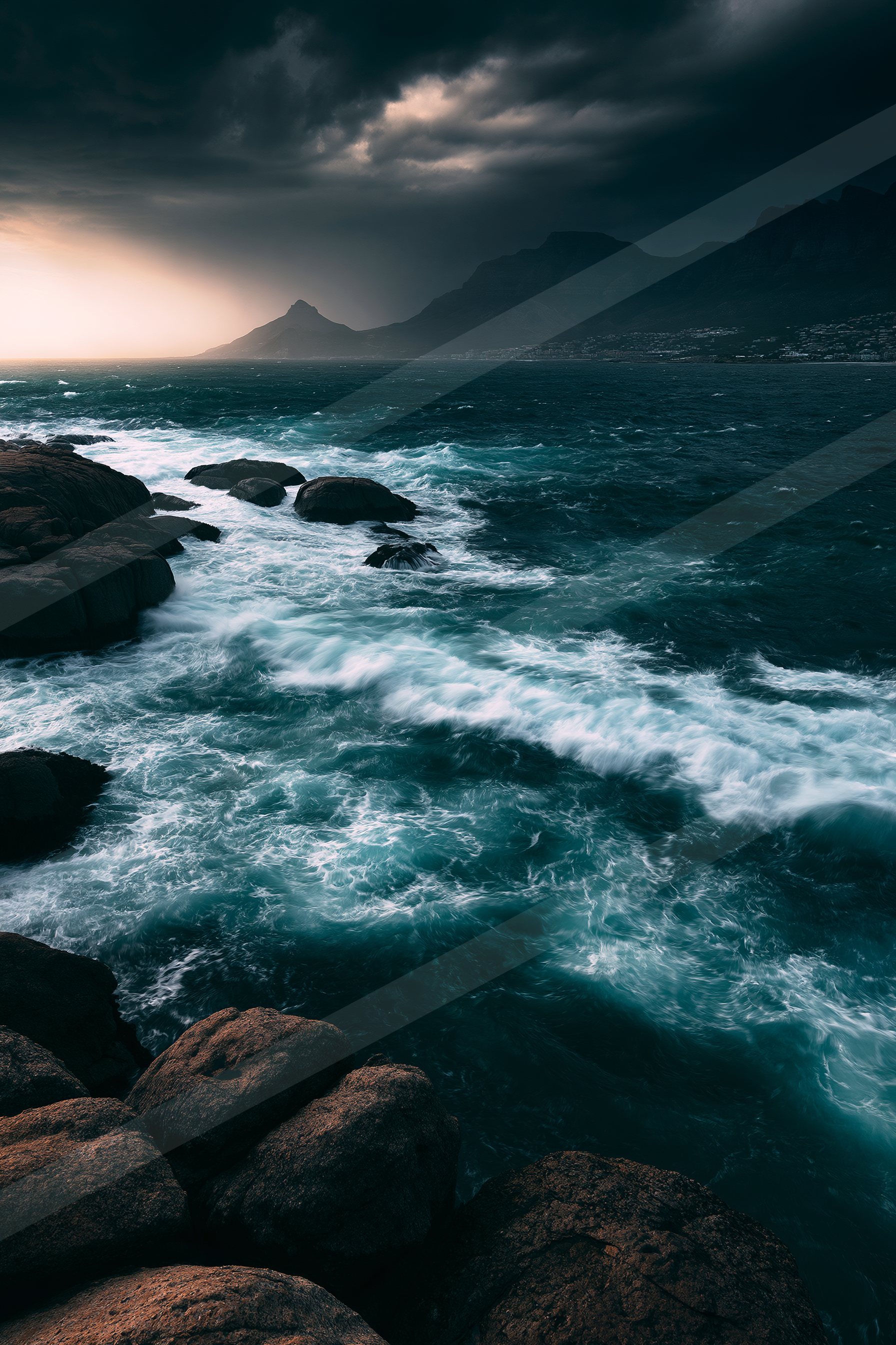 A moody coastal scene featuring turbulent ocean waves crashing against rocky shorelines under a dark, brooding sky.