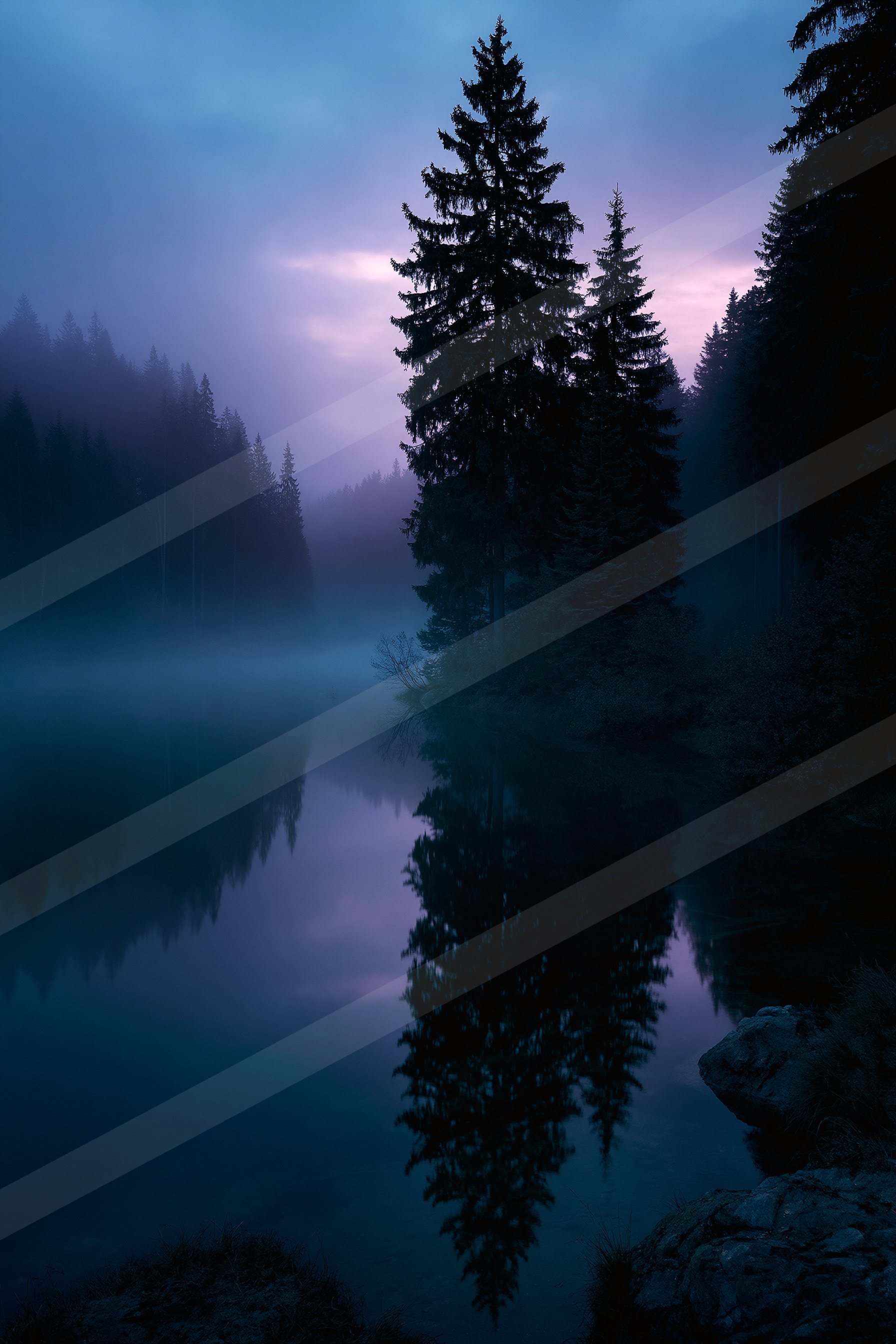 A blue hour high contrast water scene of a lake, reflection.