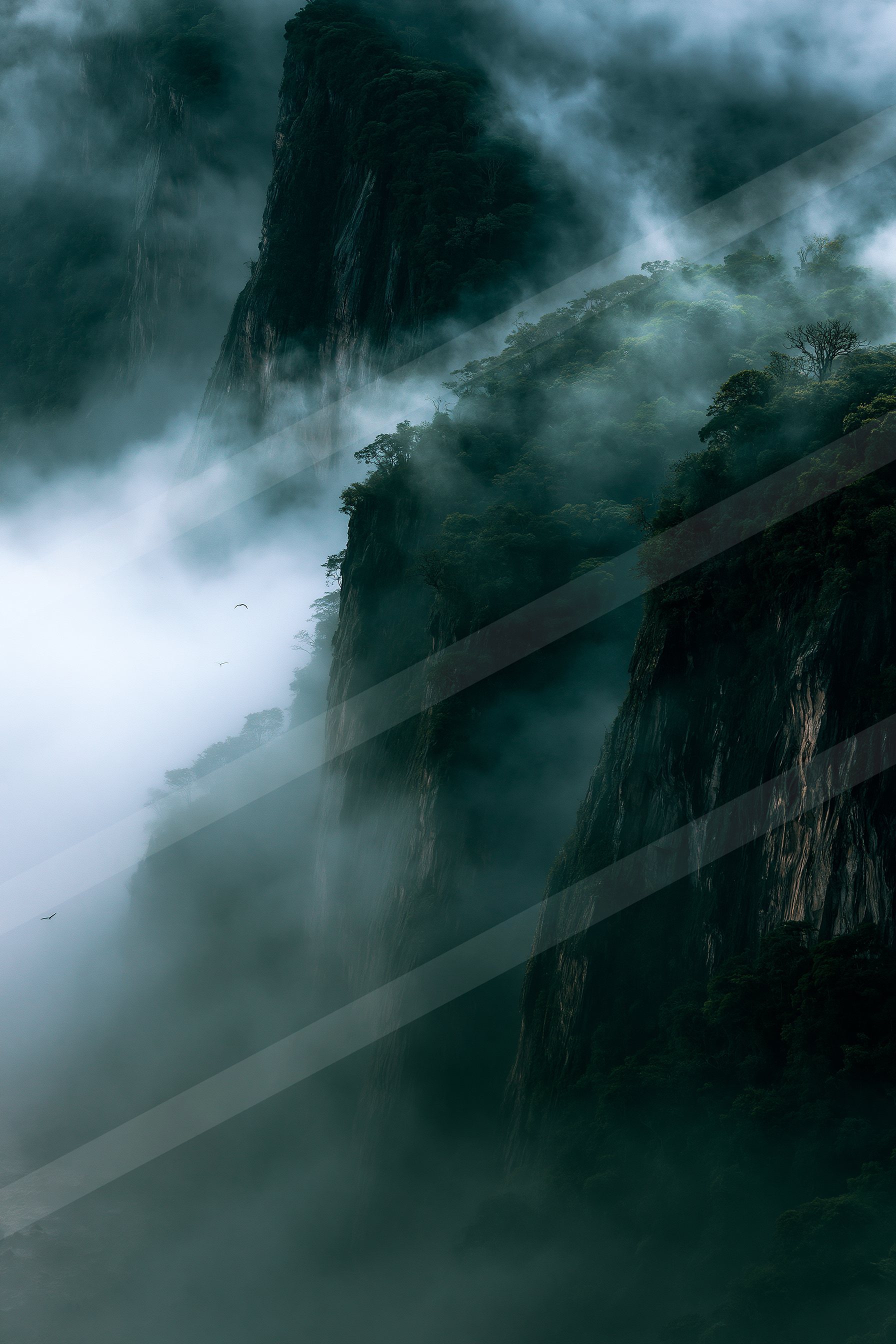 An ethereal landscape of a cliff, fog.