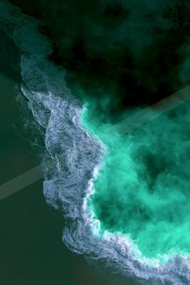 A moody water scene of river, waterfall, ocean.