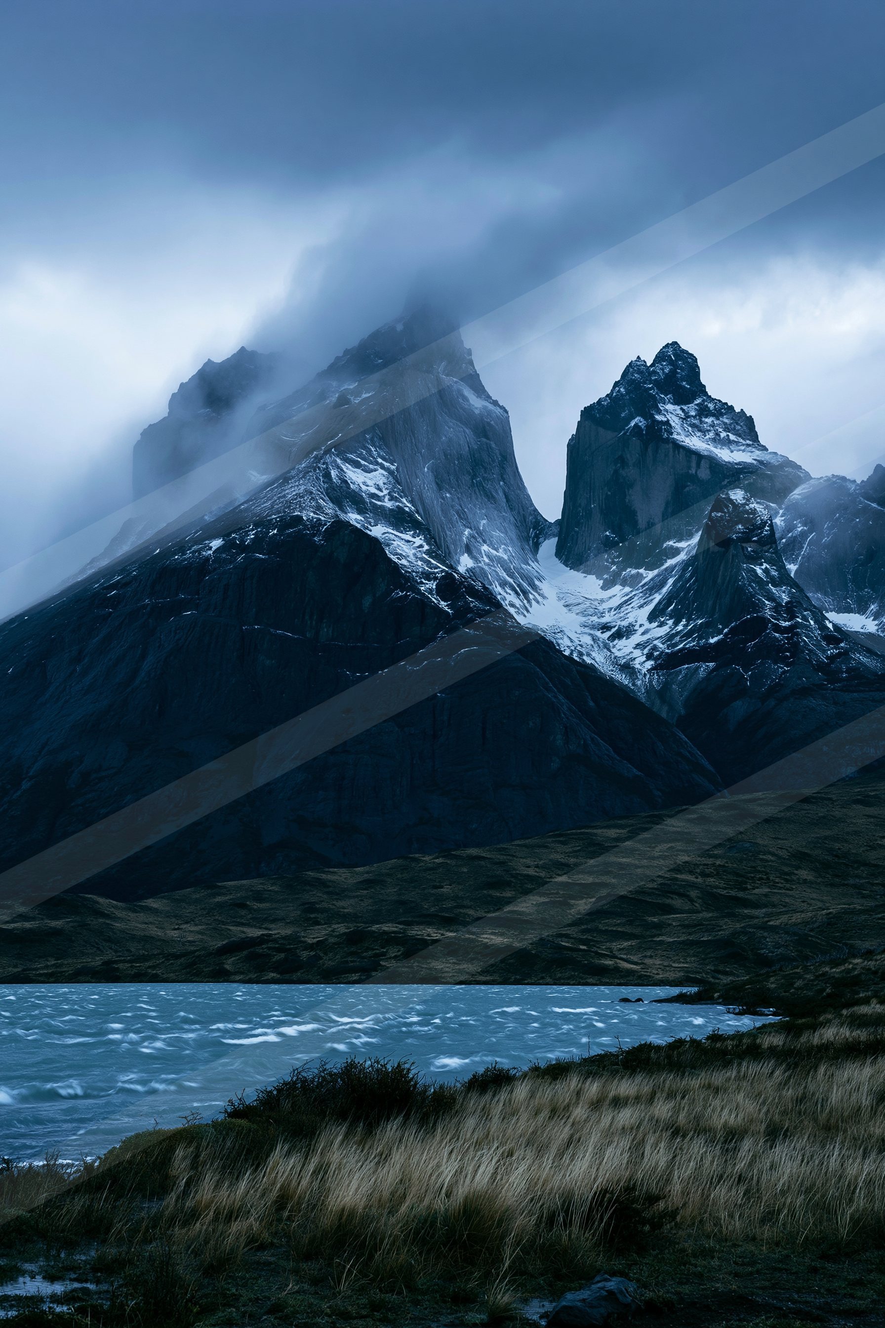 A dramatic panorama landscape of a mountains, fog.