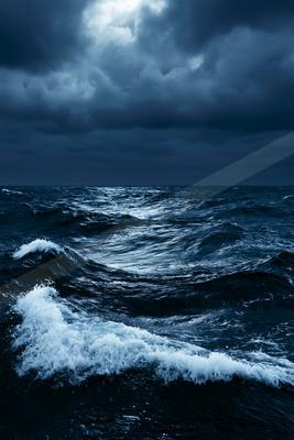 A blue hour water scene of ocean.