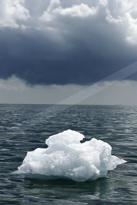 A bright sky scene of storm, ocean.