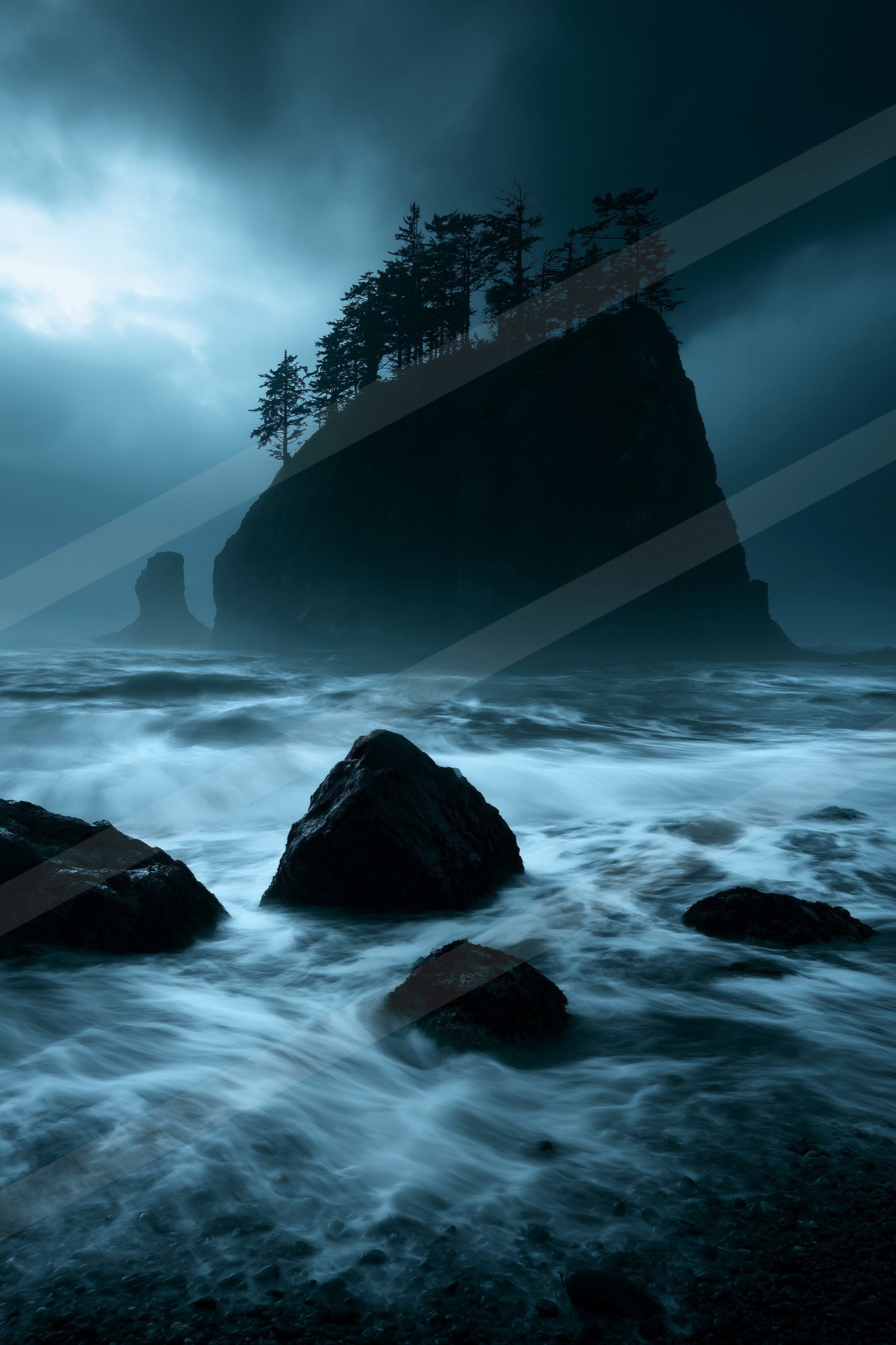 A mysterious long exposure water scene of an ocean, fog.