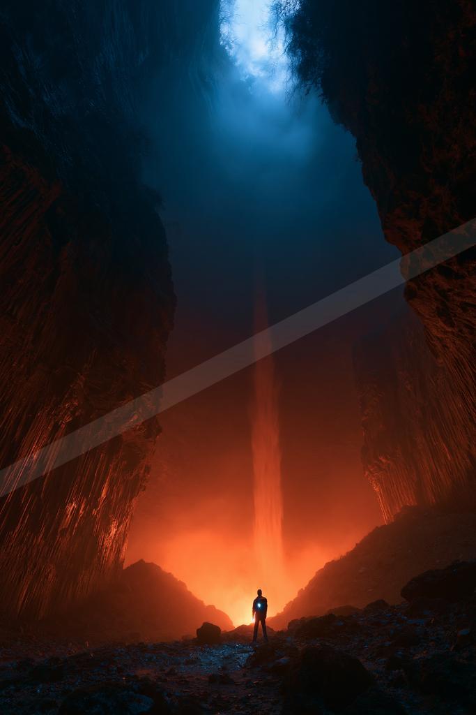A black-toned moody photograph of volcano, fountain, torch.