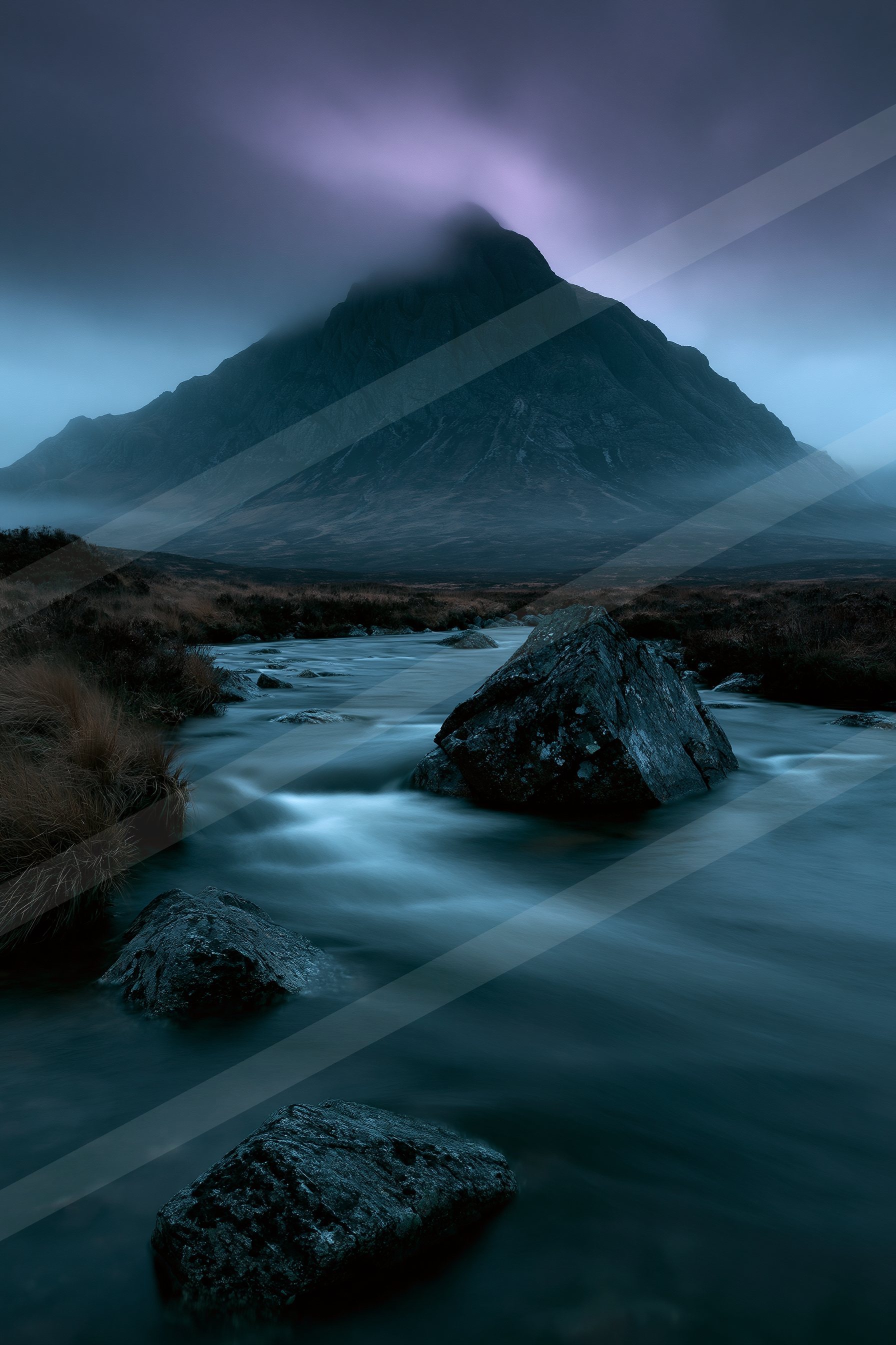 A night long exposure landscape of a volcano, fog.