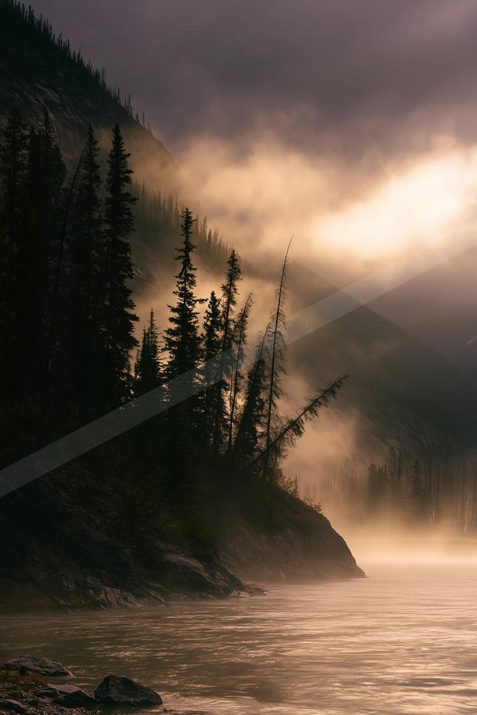 A brown-toned moody photograph of lakeside, valley, canoe.