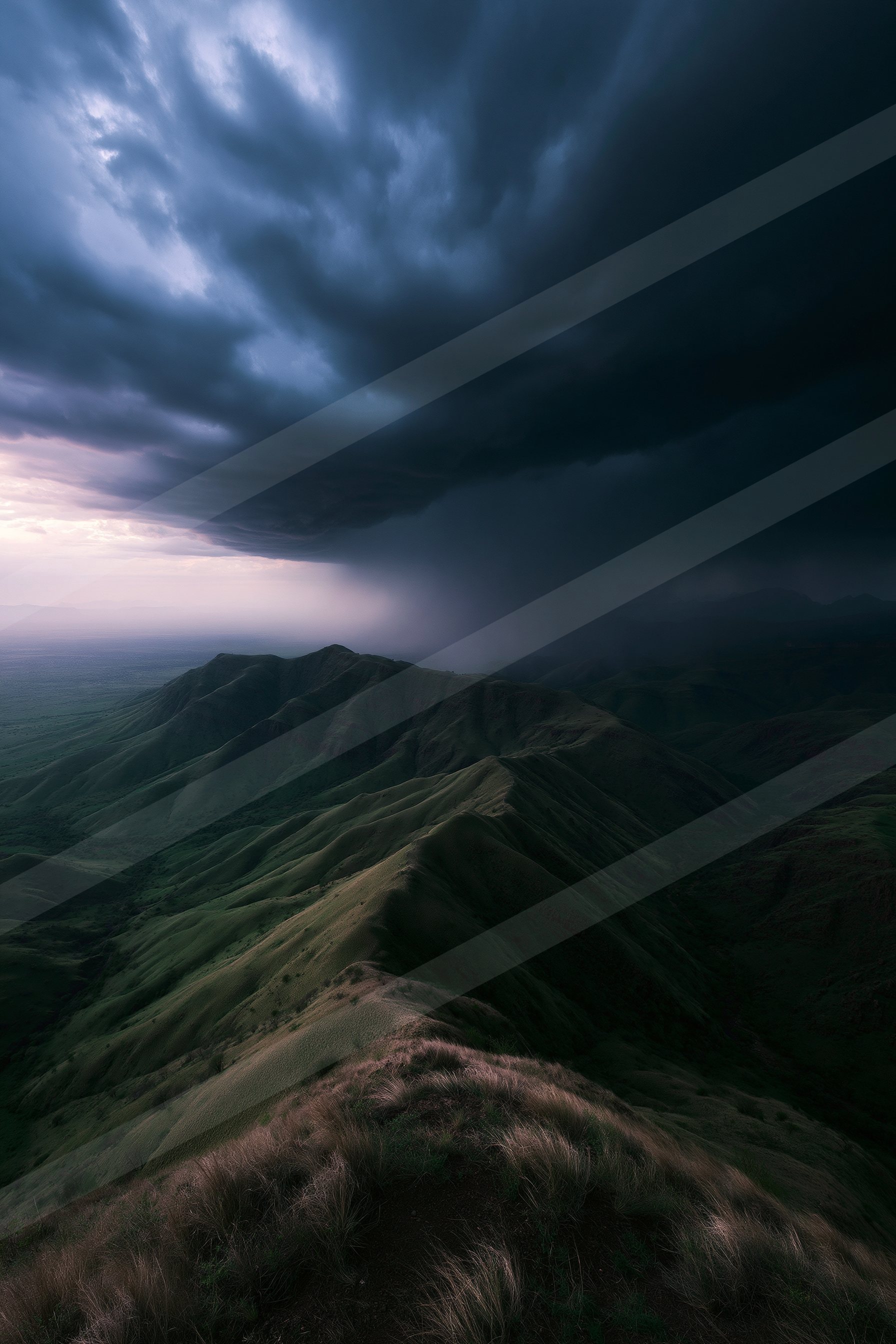 A dramatic panorama landscape of a rolling hills.