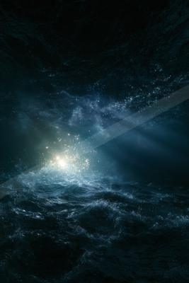 A night water scene of ocean.