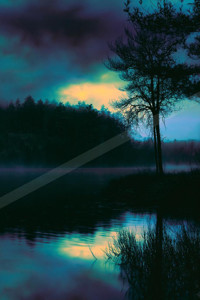 A blue hour water scene of lake.