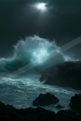A moody water scene of ocean, waterfall, storm.