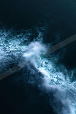 A dramatic long exposure water scene of ocean, storm, fog.