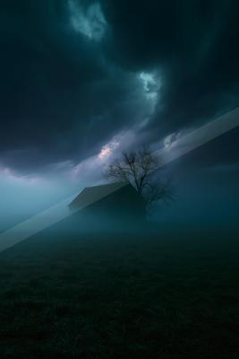 A night sky scene of storm, fog.