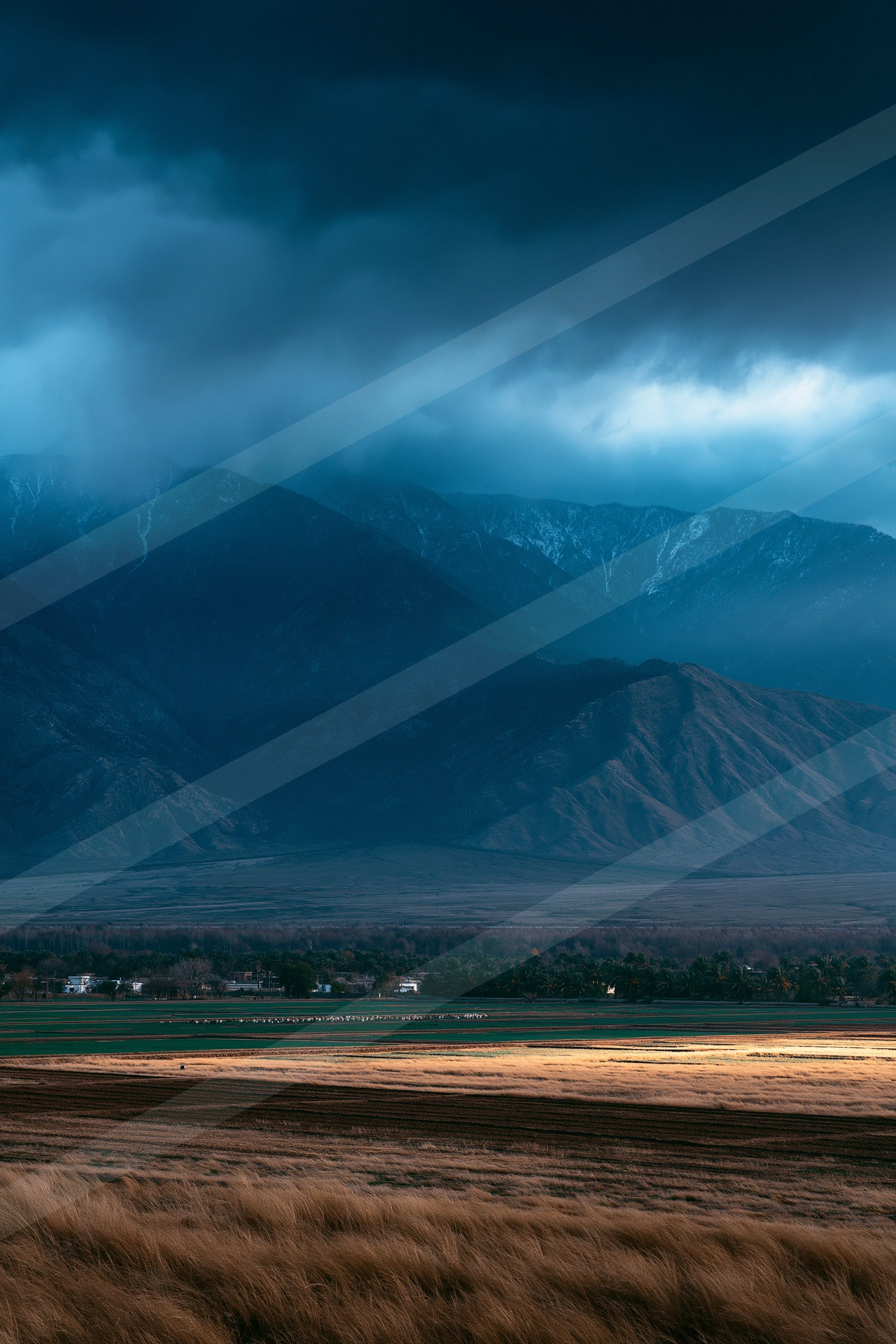 A blue hour high contrast sky scene of a storm, dust.