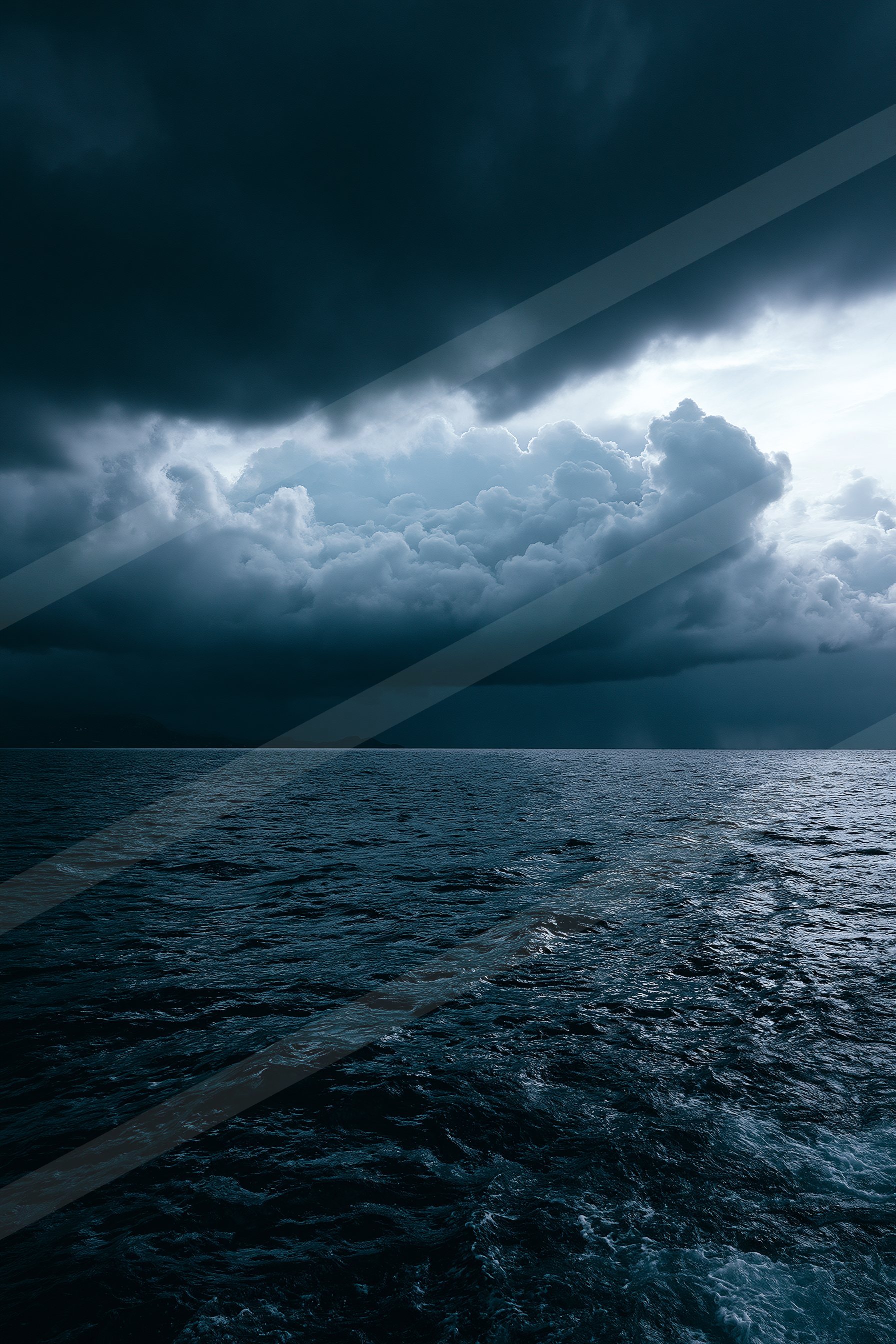 A dramatic high contrast sky scene of a storm, ripples.