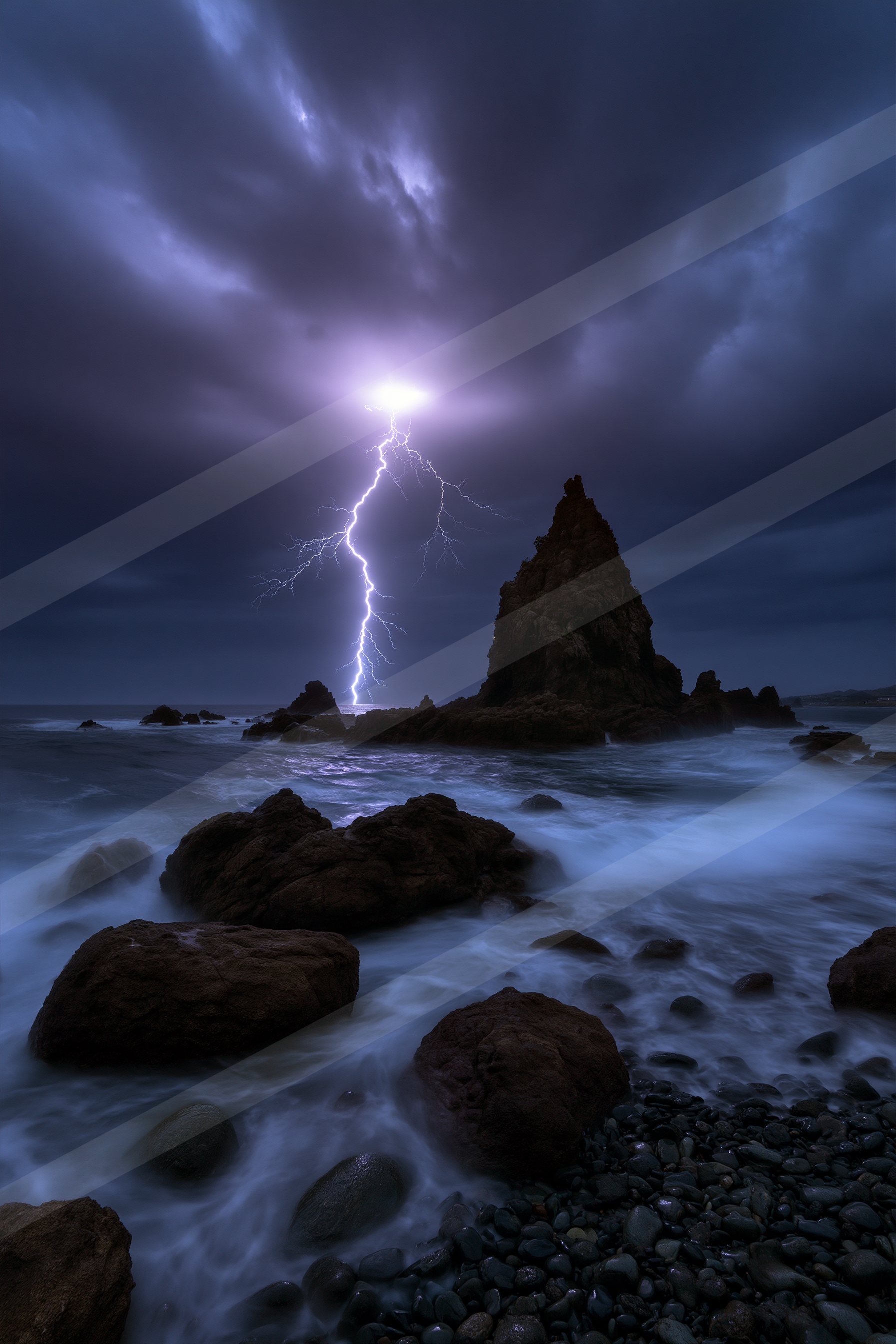 A dramatic long exposure sky scene of a lightning, rocks.