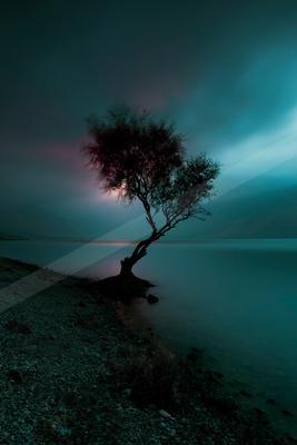 A night long exposure water scene of a lake, reflection.