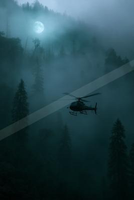 A night landscape of mountains, fog.
