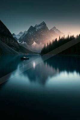 A night double exposure landscape of a mountains, reflection.