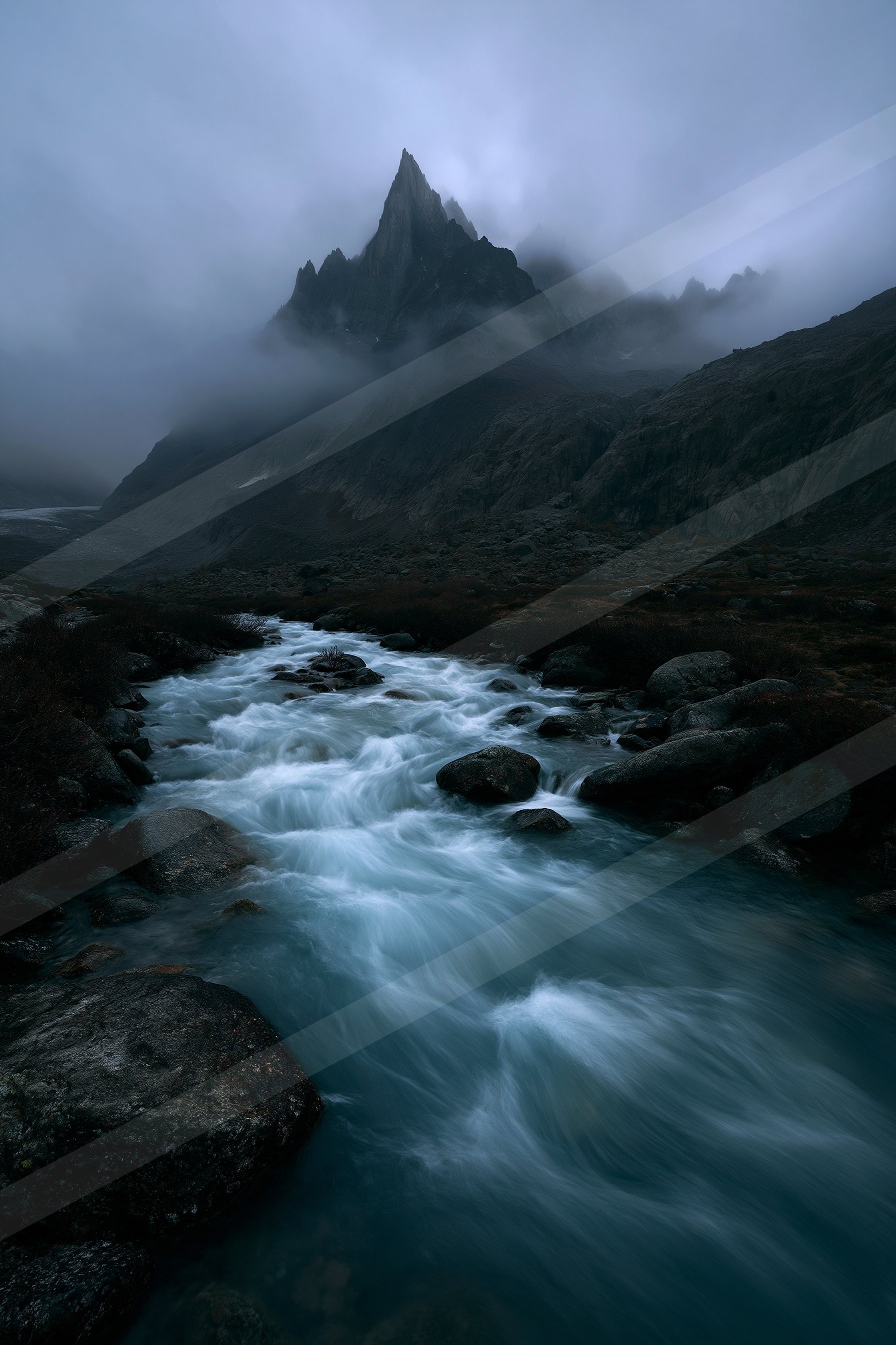 An ethereal long exposure water scene of a stream, fog.