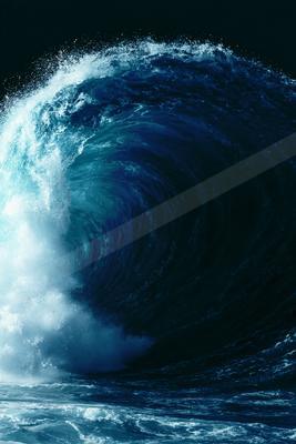 A massive ocean wave curling dramatically against a dark night sky.