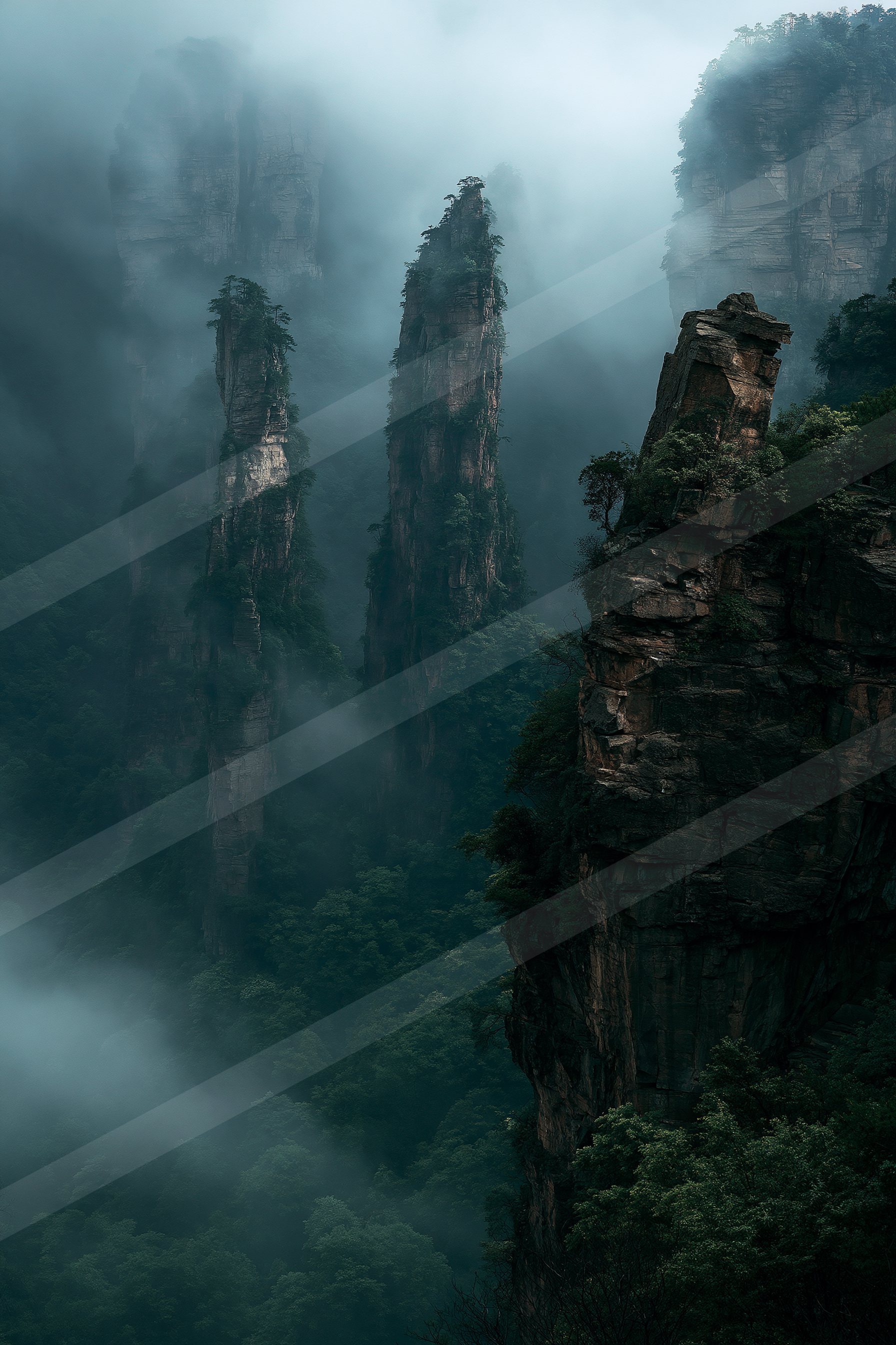 A mysterious landscape of a mountains, fog.