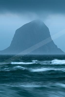 A mysterious landscape of a volcano, fog.