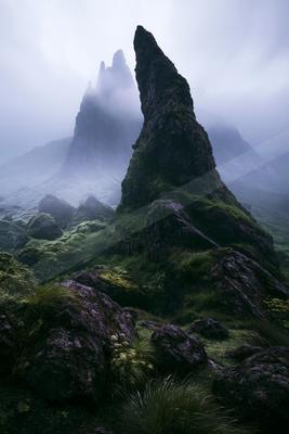A moody landscape of mountains.